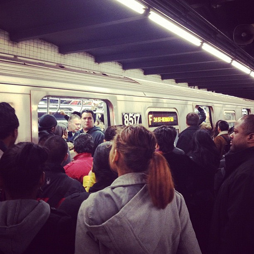 Crowded NYC subway stop