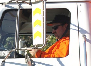 Truck driver texting behind the wheel
