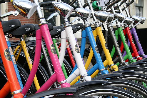 Row of multicolored bicycles
